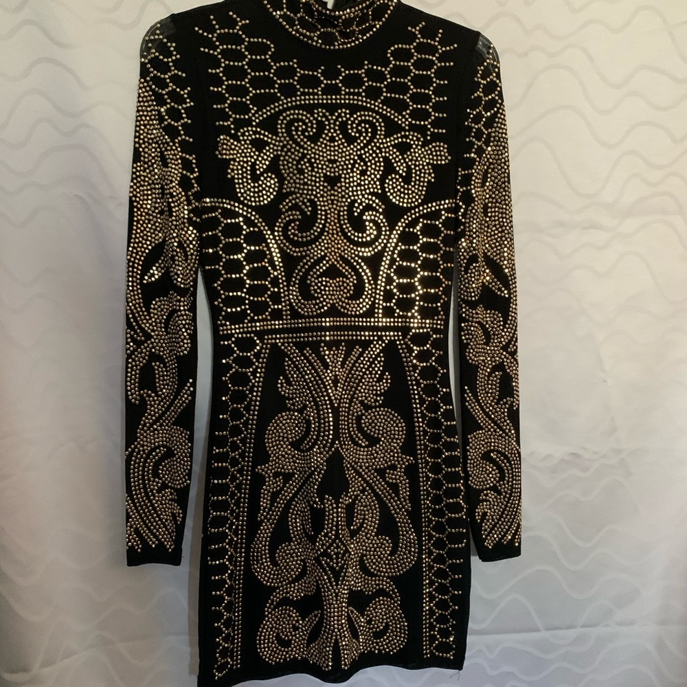 All black long sleeves with gold pattern